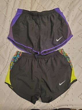 Nike Women’s Black Athletic Shorts with Purple Trim and Neon Yellow Accents